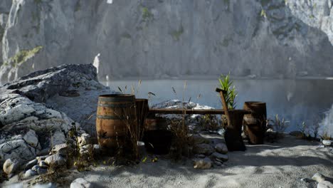 wooden-barrels-with-sea-fish-at-the-sand-beach